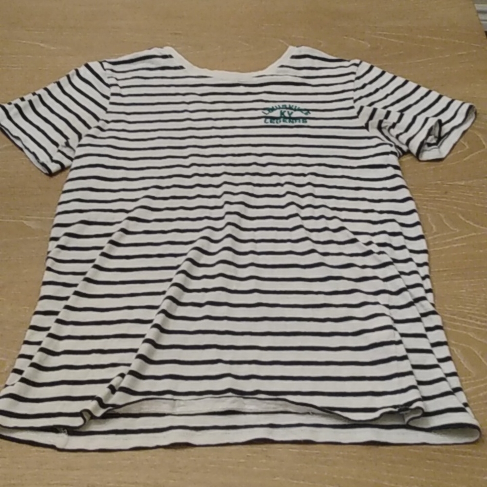 Striped H&M shirt with green text.